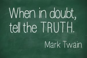 Famous Mark Twain quote "When in doubt, tell the truth" on blackboard