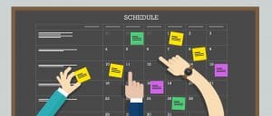 calendar schedule board with hand collaboration plan board