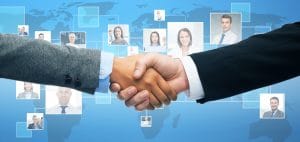 business and office concept - businessman and businesswoman shaking hands