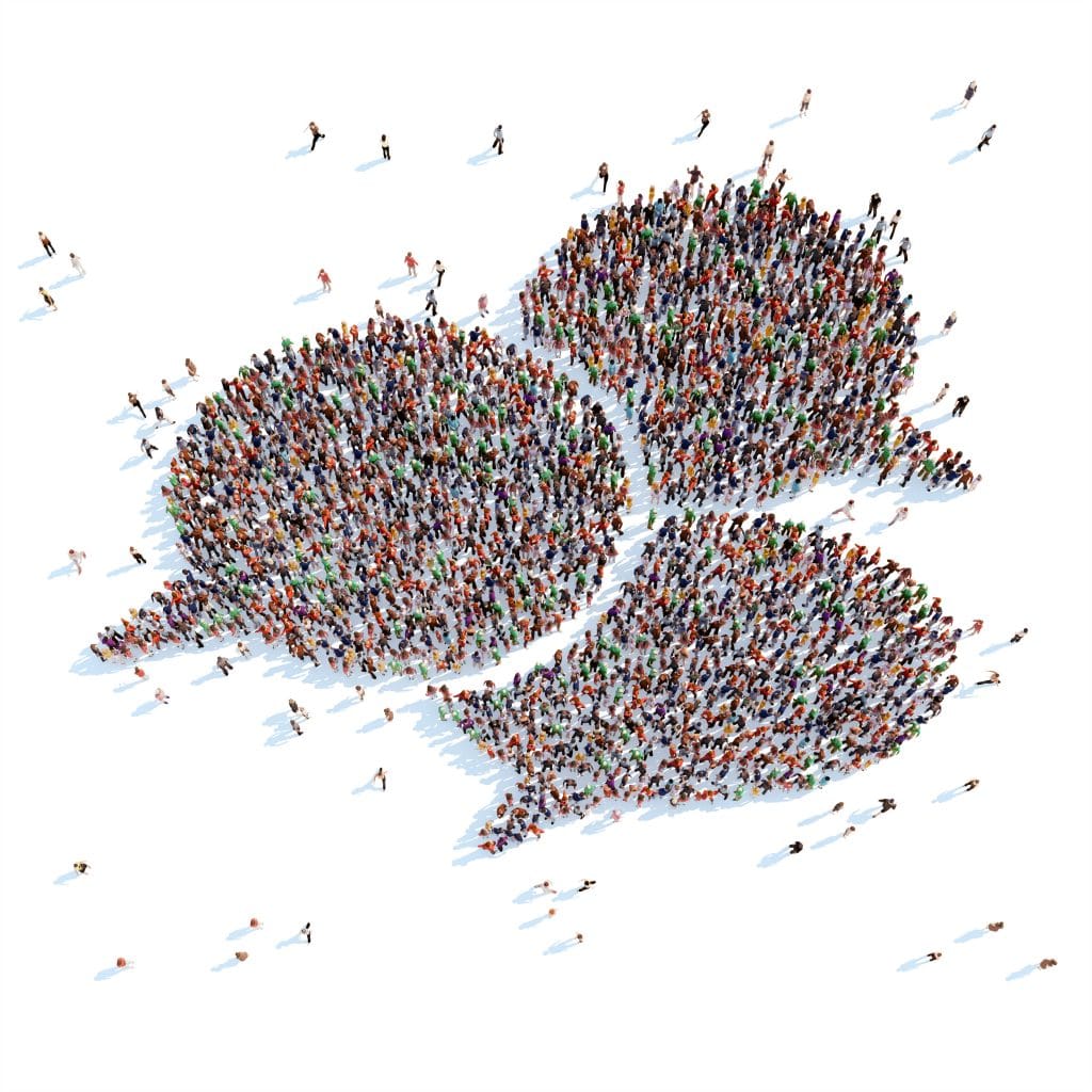 Large group of people in the shape of a chat bubble.