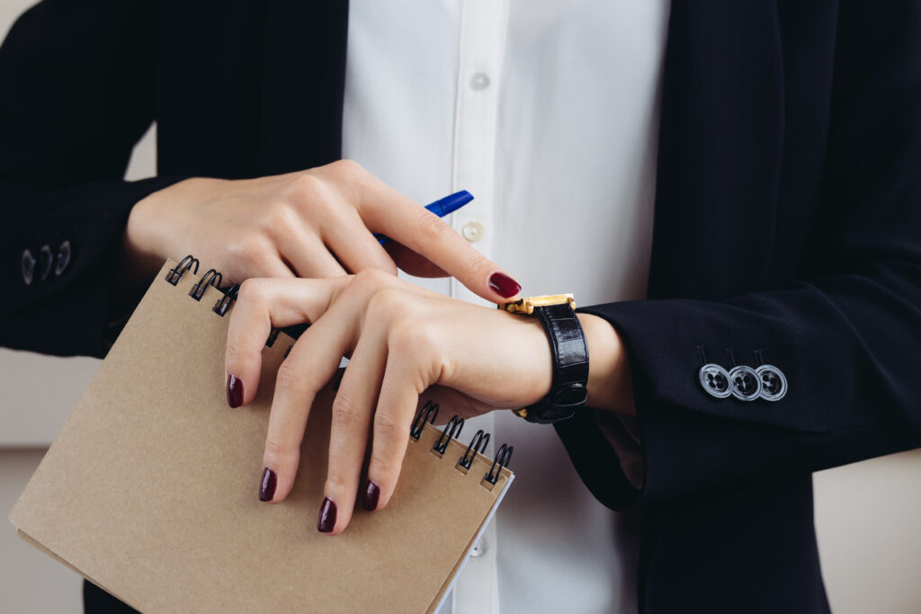 Woman looking at watch, content marketing