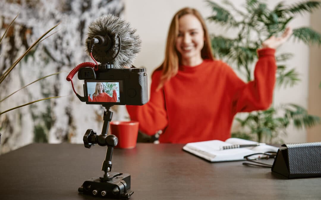 A young woman creates video content as part of her digital marketing strategy