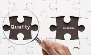 quality over quantity in business blogging puzzle pieces