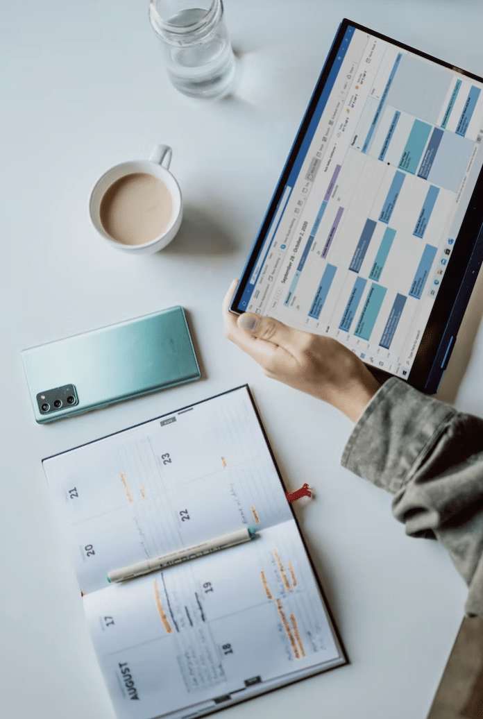 seasonal marketing calendar notebook and ipad