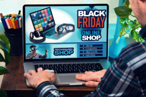 man shopping online with laptop and looking at black friday deals on gadgets conversion