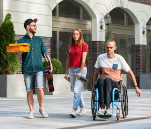 three-girls-media-blog-diversity-equality-inclusion-inclusive-image-of-man-woman-and-disabled-friends-walking-and-talking